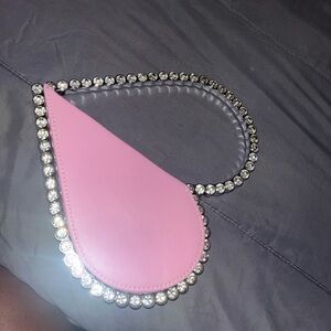 Heart shaped pink clutch purse